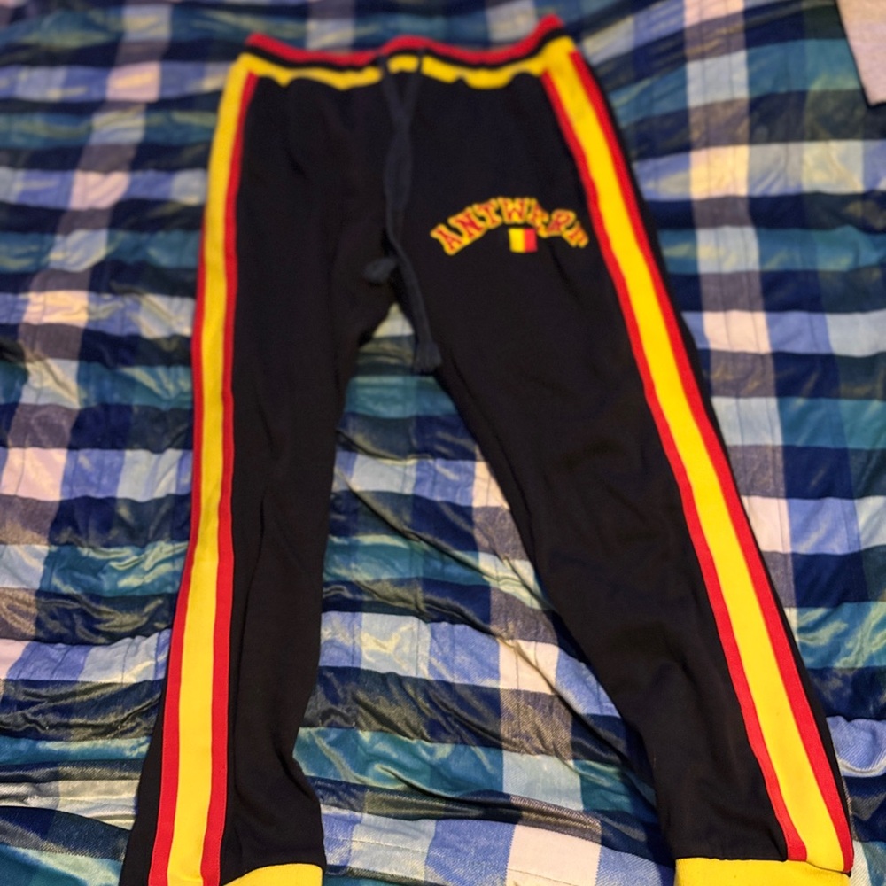 ANTWEAR Black Joggers with Red and Yellow Stripes